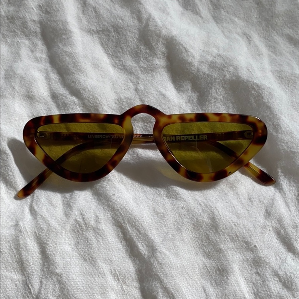 Man repeller unibrow sunglasses
